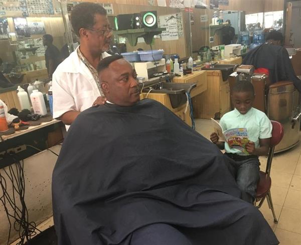 Community Readers at Laveaux Barbershop in Sunrise, FL.